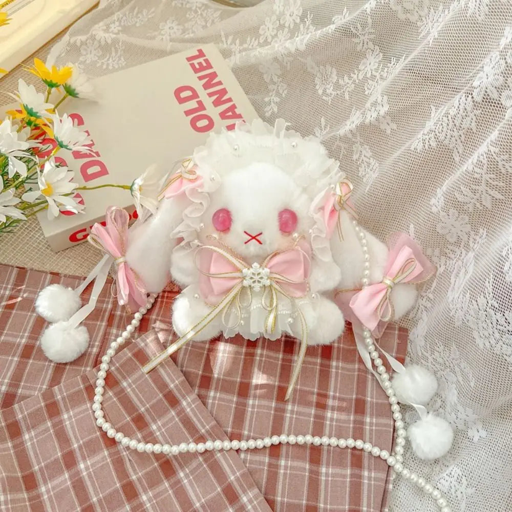 Monedero de peluche de conejito y lazos