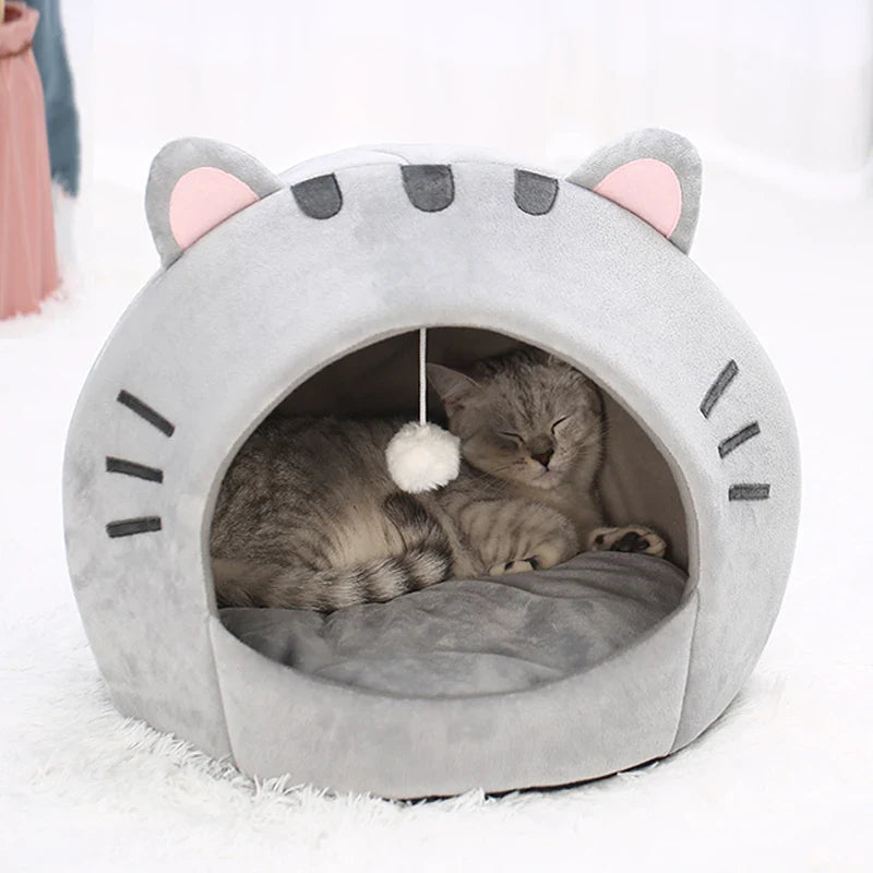 Bonita cama para gatos con forma de gato