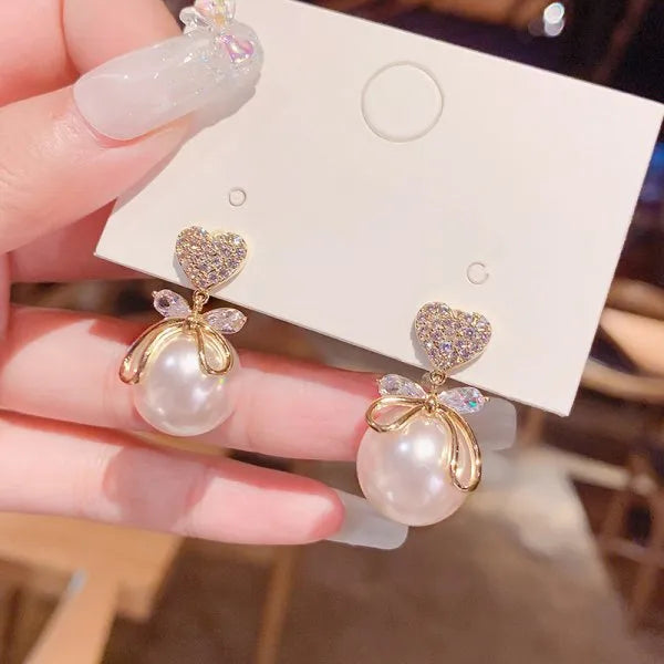 Pendientes con adornos navideños