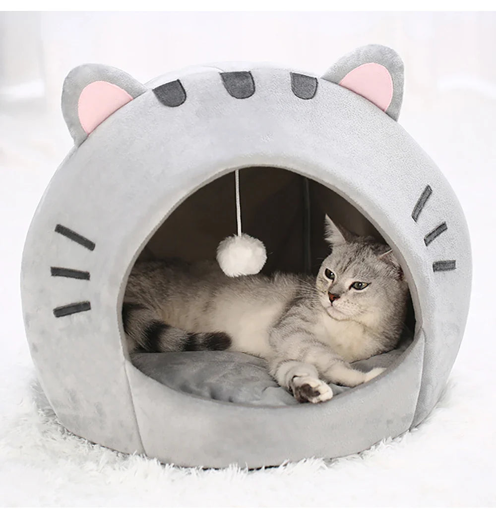 Bonita cama para gatos con forma de gato