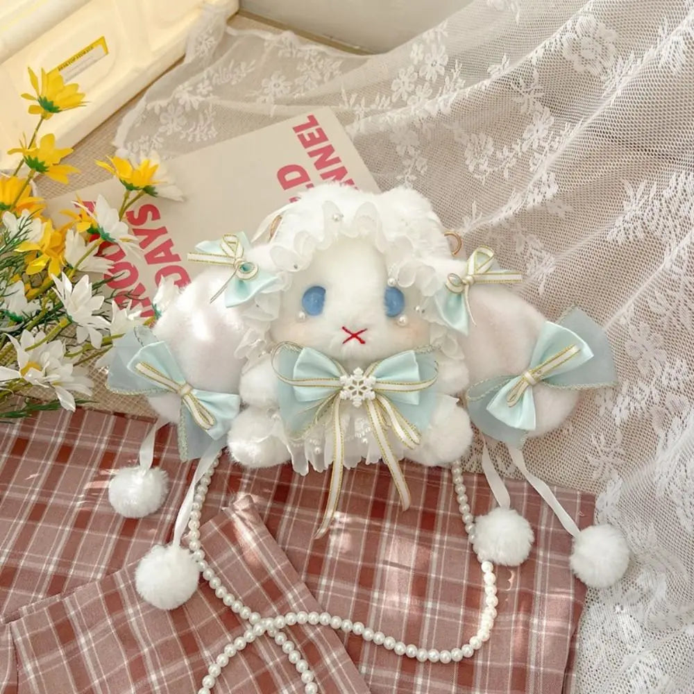 Monedero de peluche de conejito y lazos