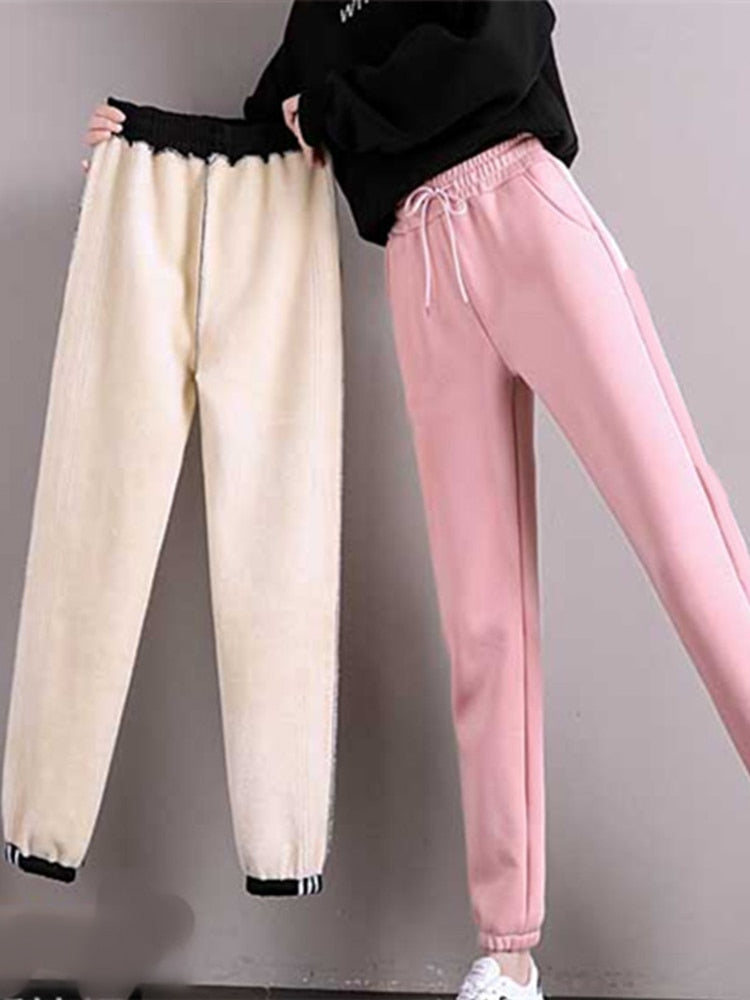 Pantalones deportivos con forro polar rosa