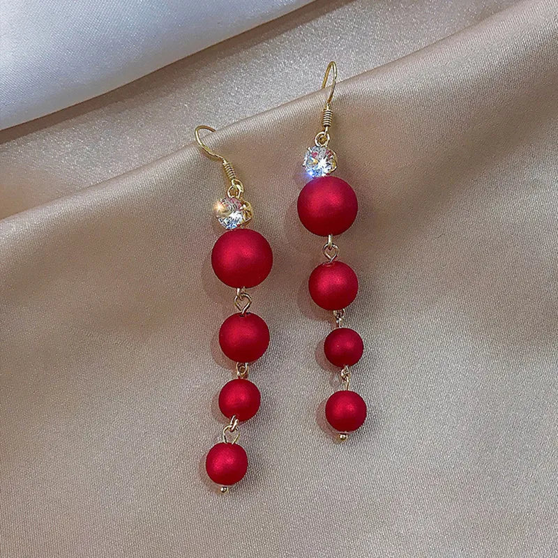 Pendientes con adornos navideños