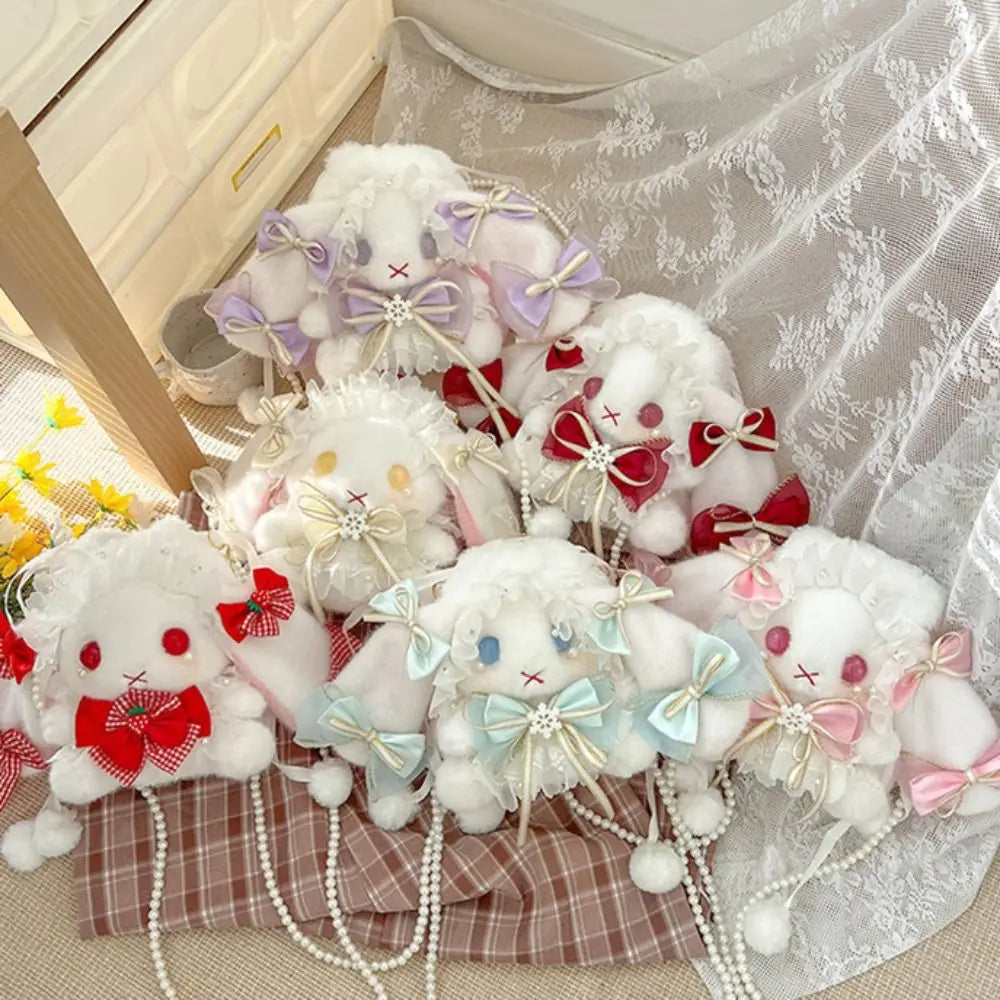 Monedero de peluche de conejito y lazos