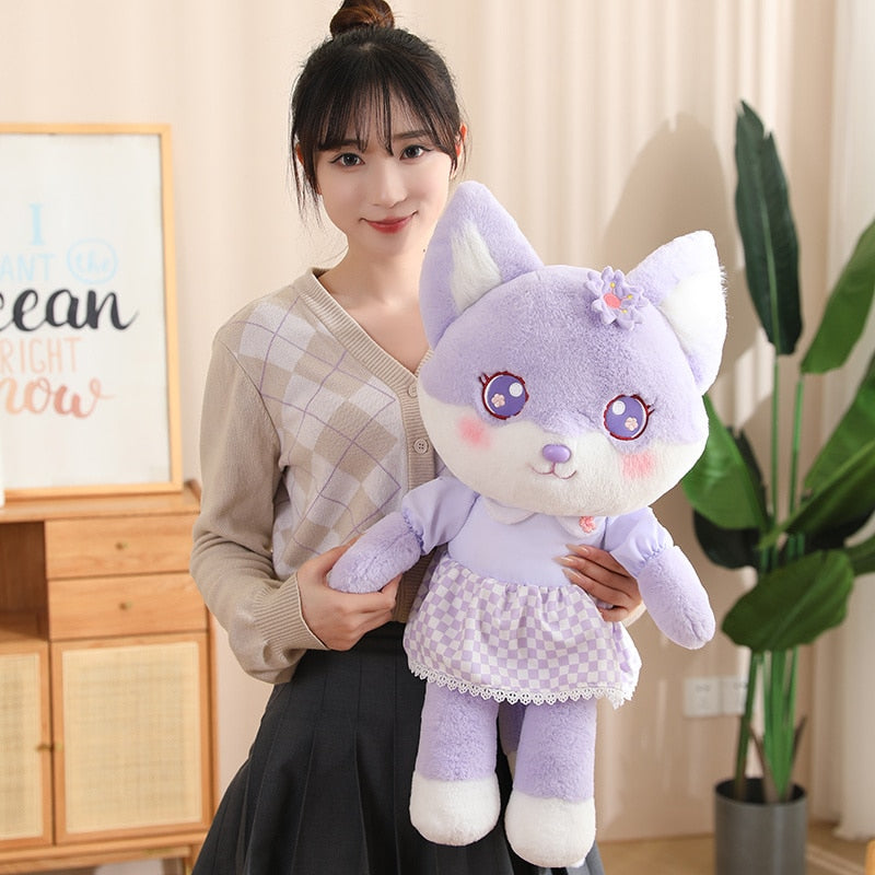 Peluche de zorro en flor de cerezo