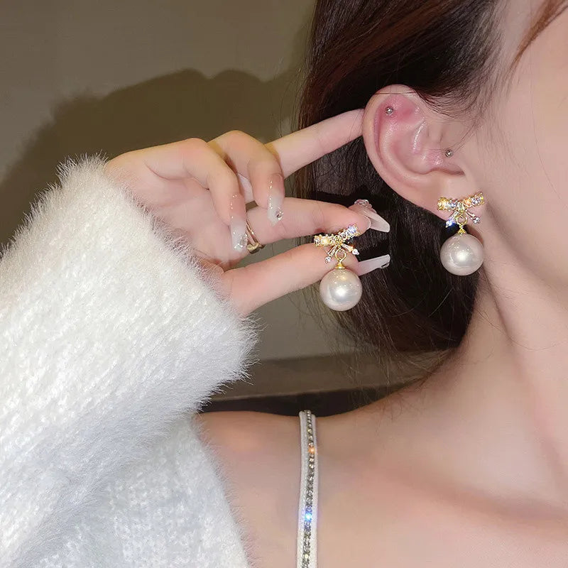 Pendientes con adornos navideños