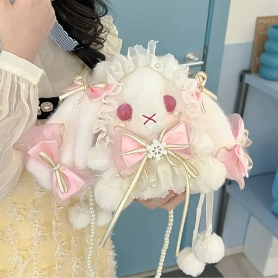 Monedero de peluche de conejito y lazos