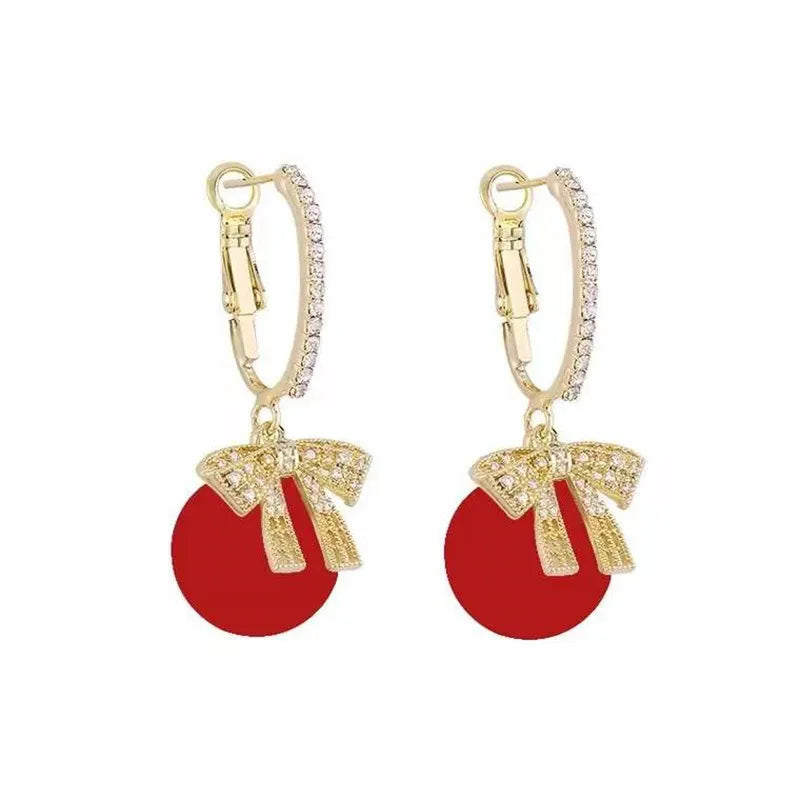 Pendientes con adornos navideños