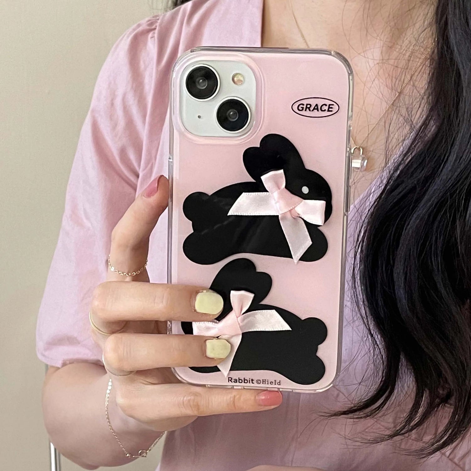 Funda para iPhone con lazo rosa y conejito negro