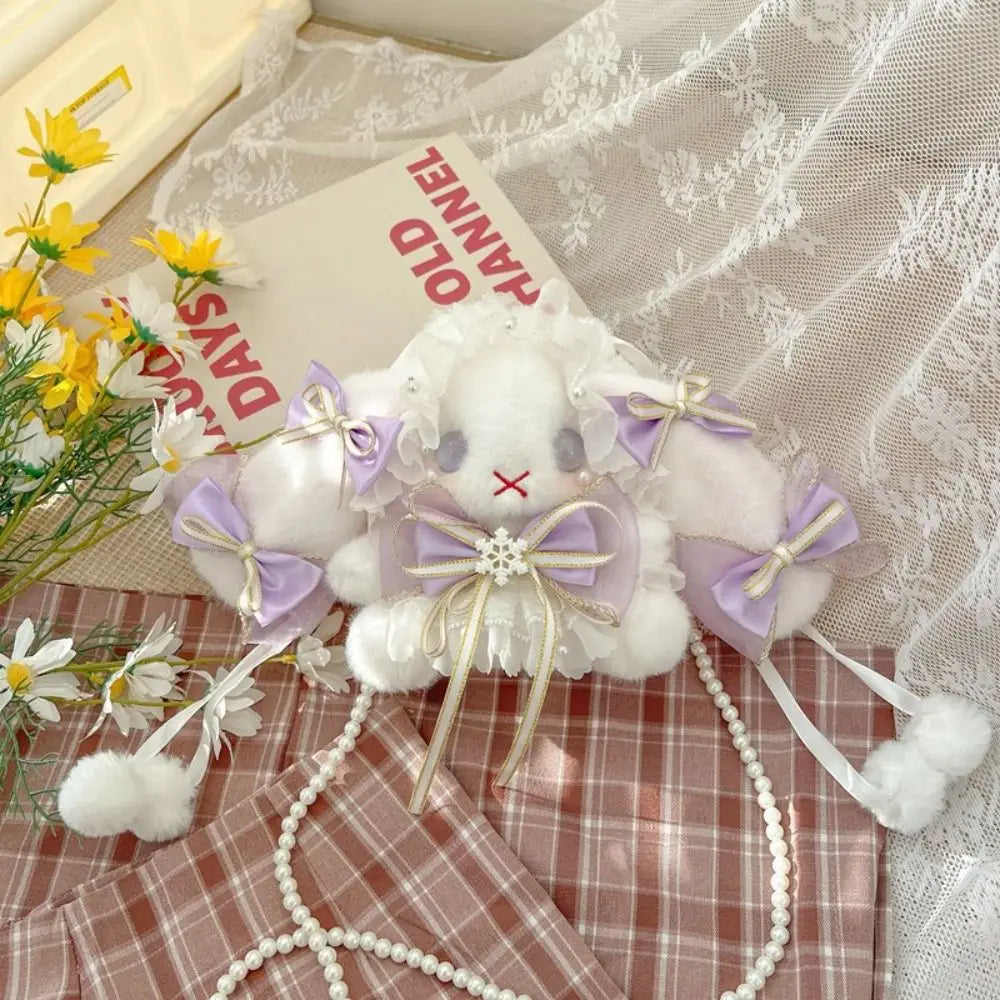 Monedero de peluche de conejito y lazos