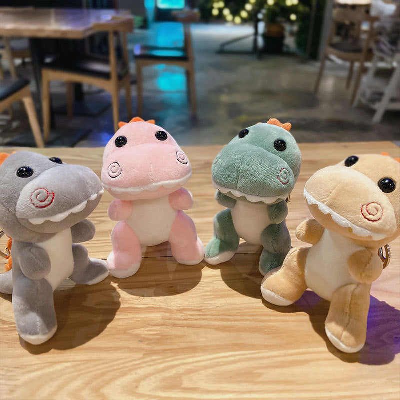 Llavero de dinosaurio de peluche