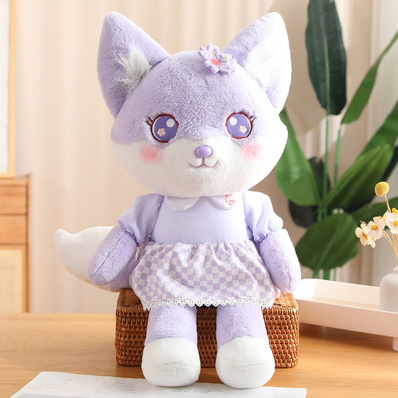 Peluche de zorro en flor de cerezo
