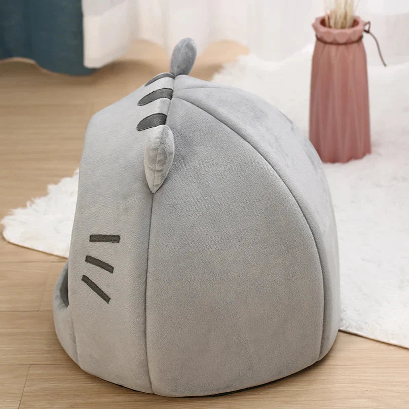 Bonita cama para gatos con forma de gato