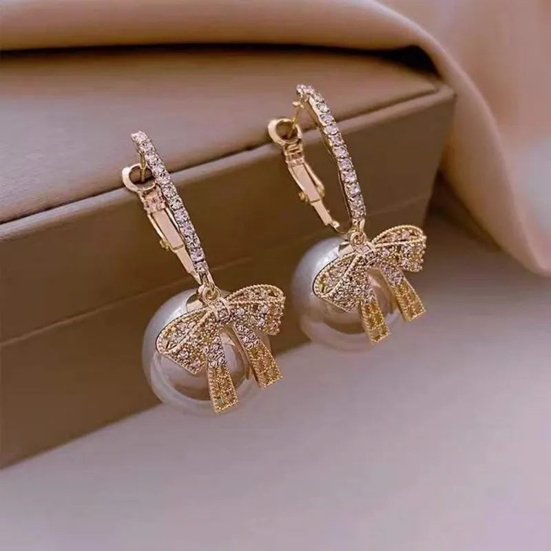 Pendientes con adornos navideños