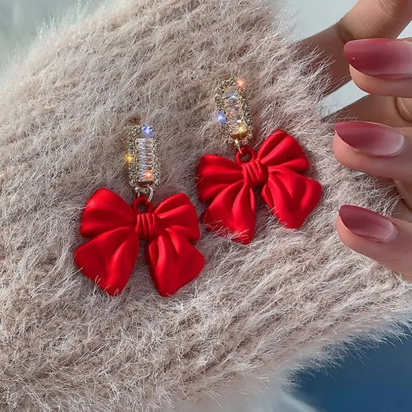 Pendientes con adornos navideños