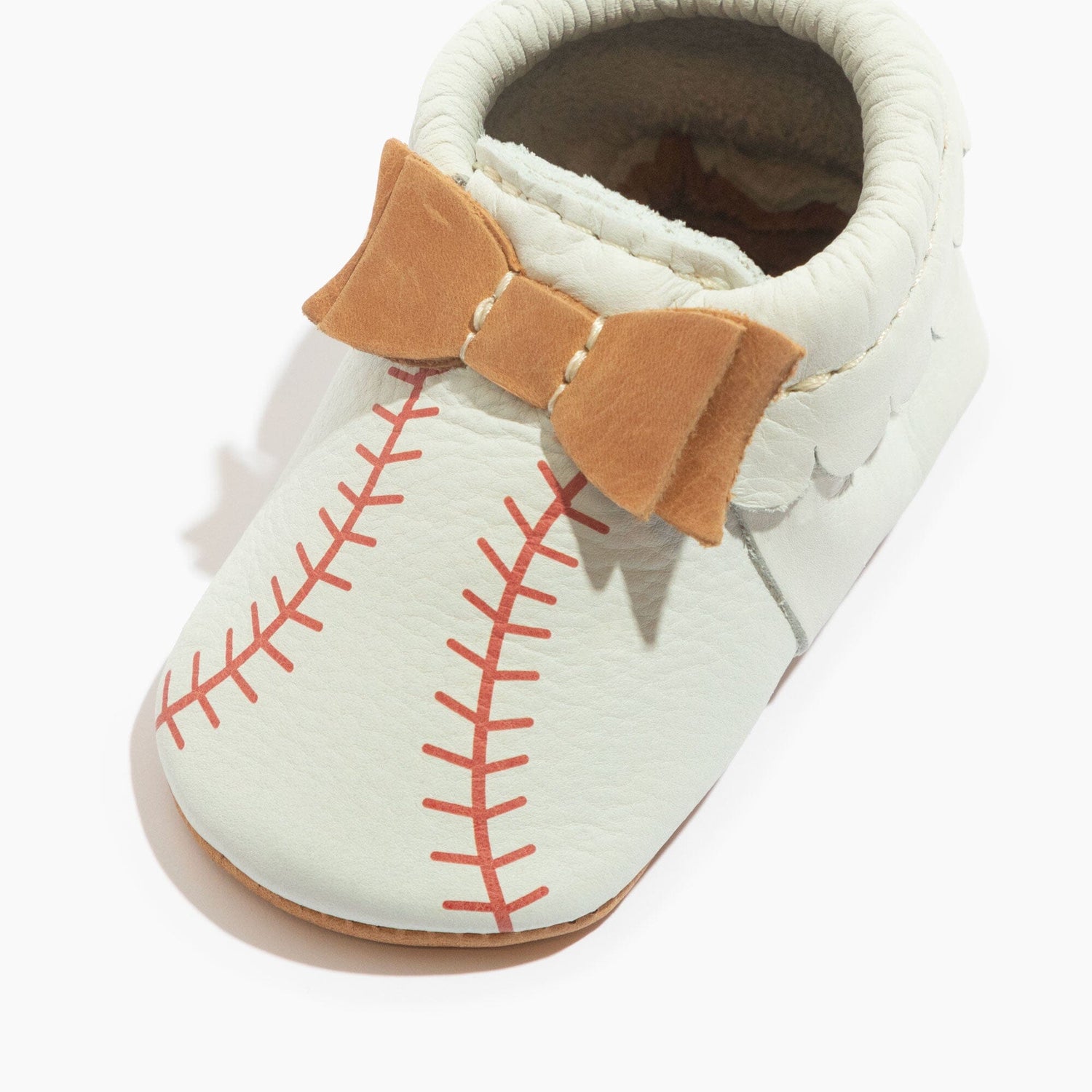 Zapato de bebé con lazo de entrenamiento de primavera