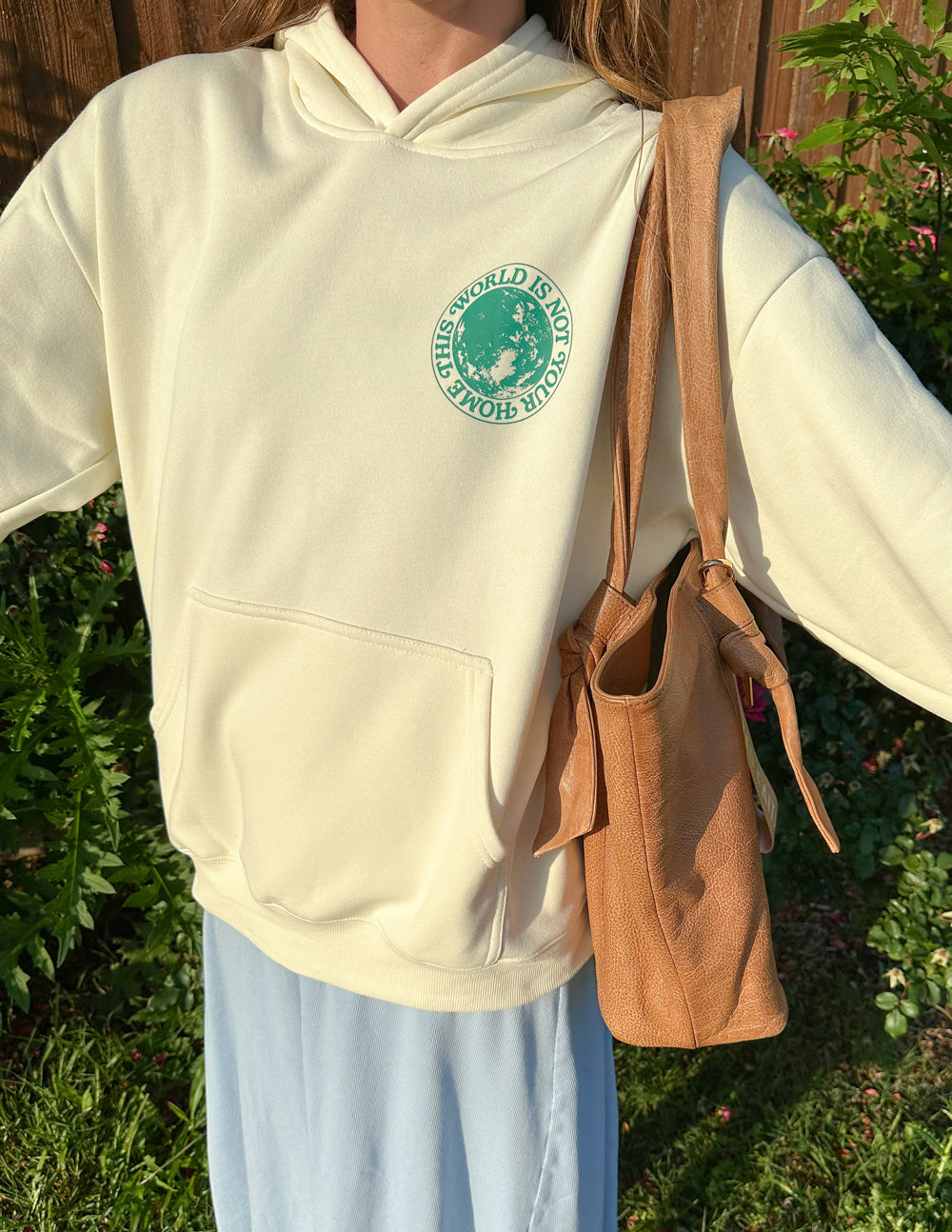 Sudadera unisex con capucha "Este mundo no es tu hogar"