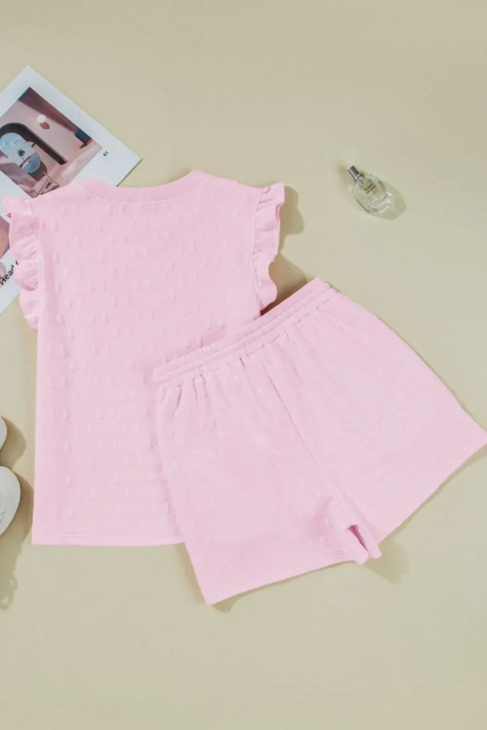 Conjunto de top y pantalones cortos con mangas cortas y volantes de jacquard con lazo
