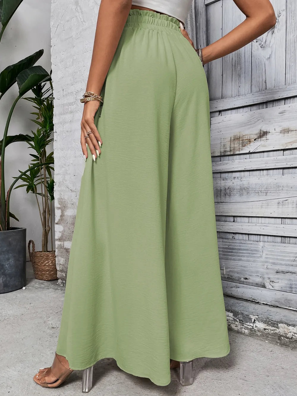 Pantalones anchos de cintura alta con lazo de miel
