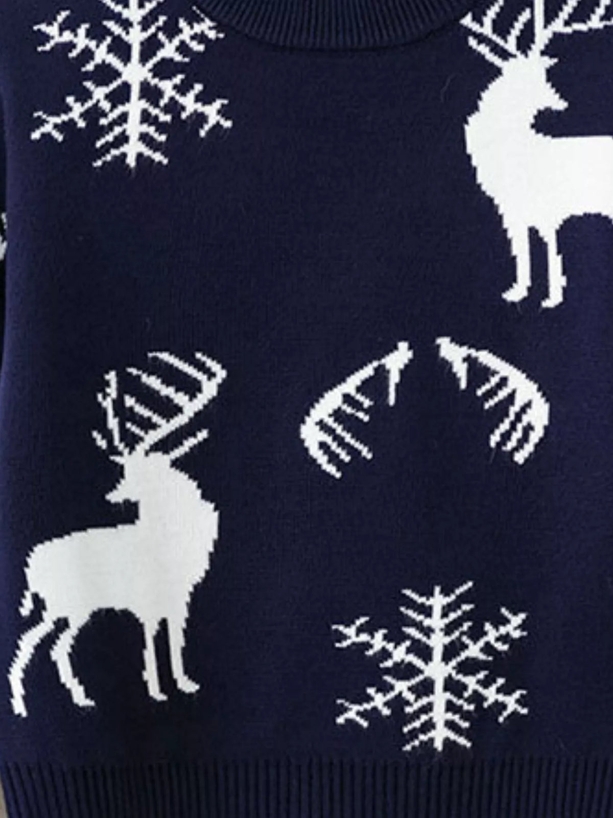Suéter de punto de reno y copos de nieve para niños