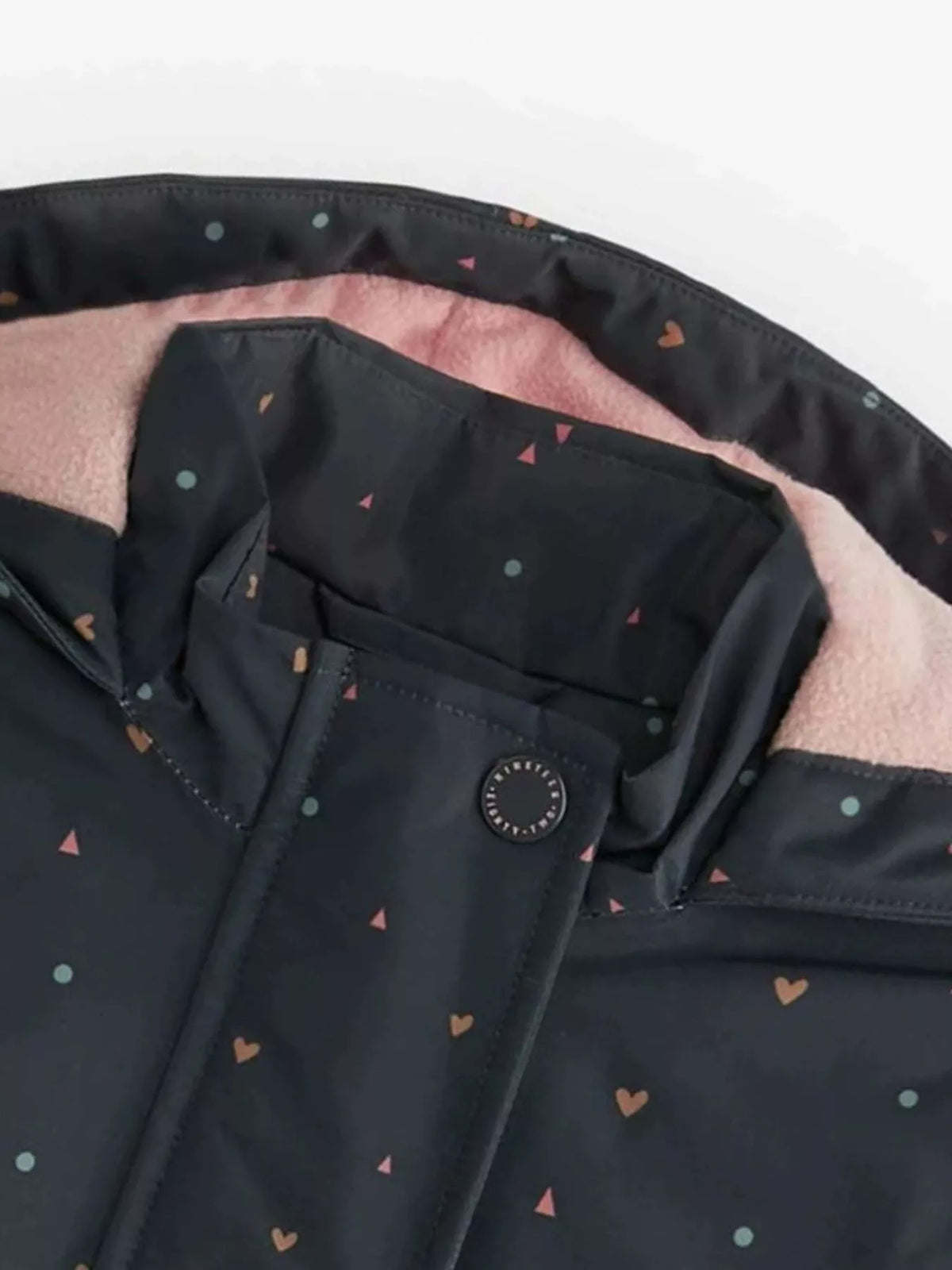 Chaqueta con cremallera estampada de corazones para niños