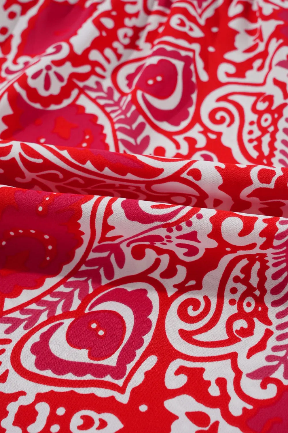 Vestido largo de cintura alta con mangas abullonadas y abertura lateral con estampado de cachemira