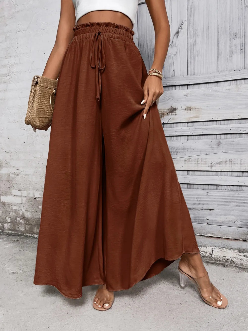 Pantalones anchos de cintura alta con lazo de miel