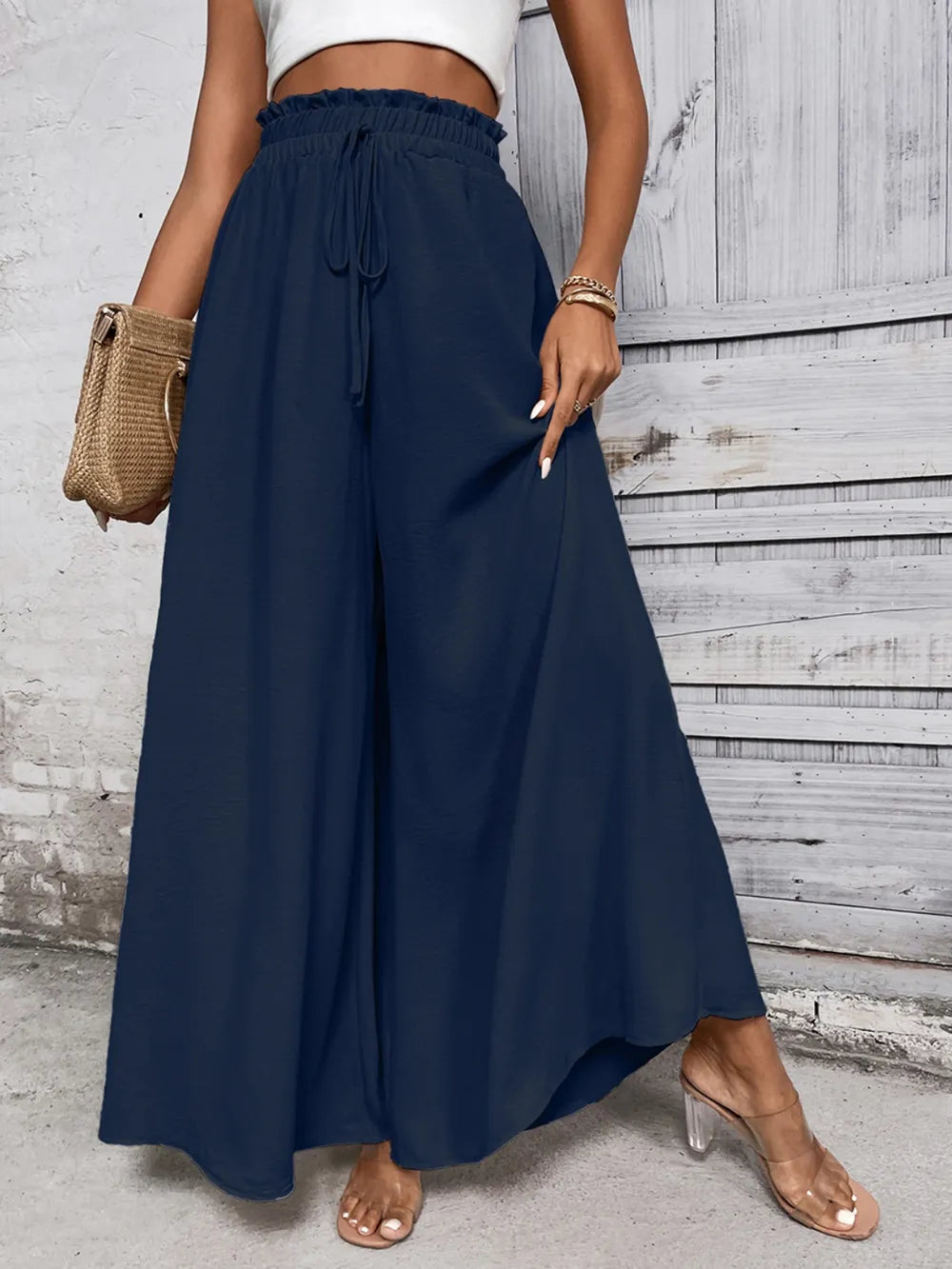 Pantalones anchos de cintura alta con lazo de miel