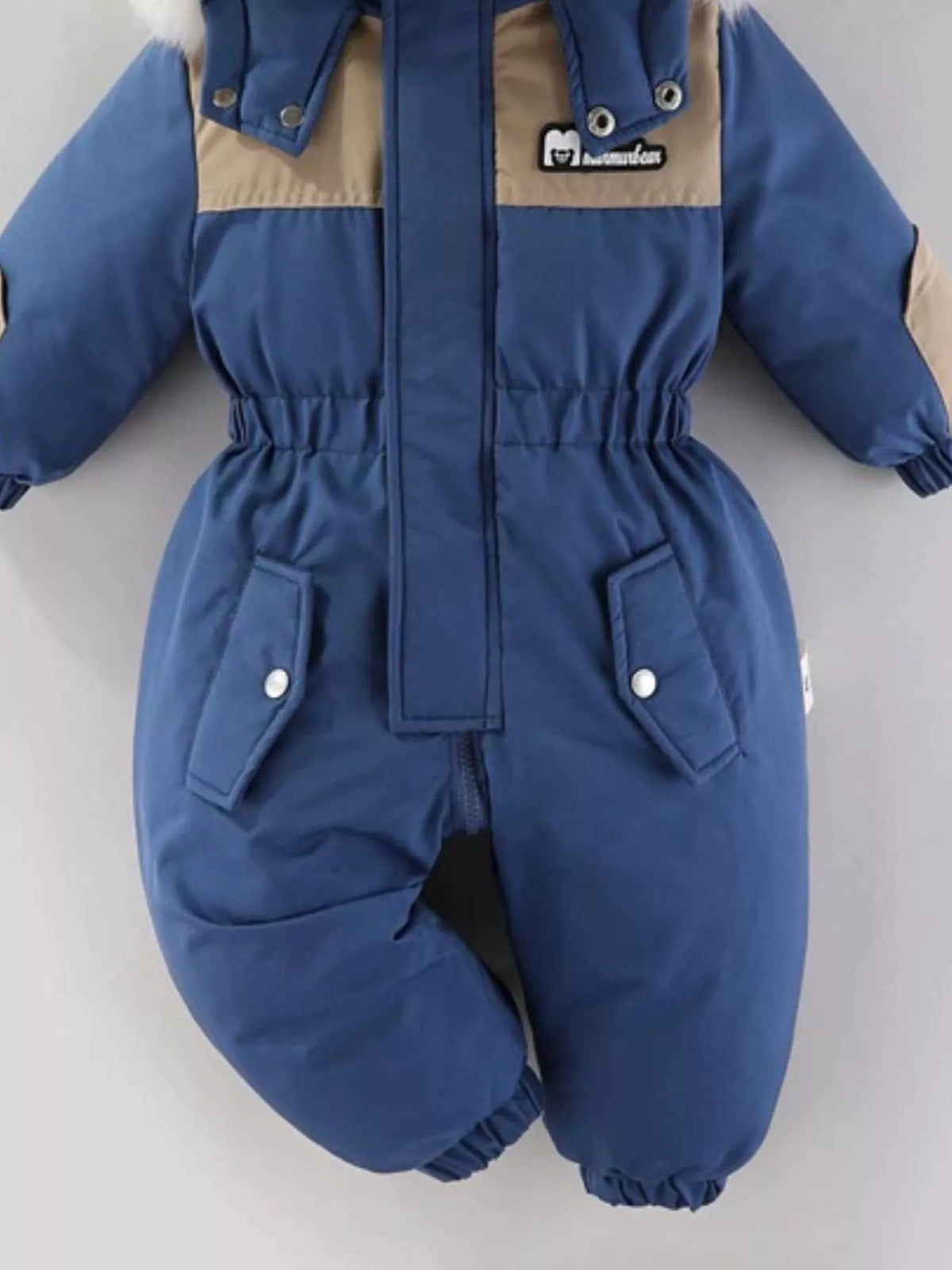 Mono de una pieza con capucha de piel sintética para niños