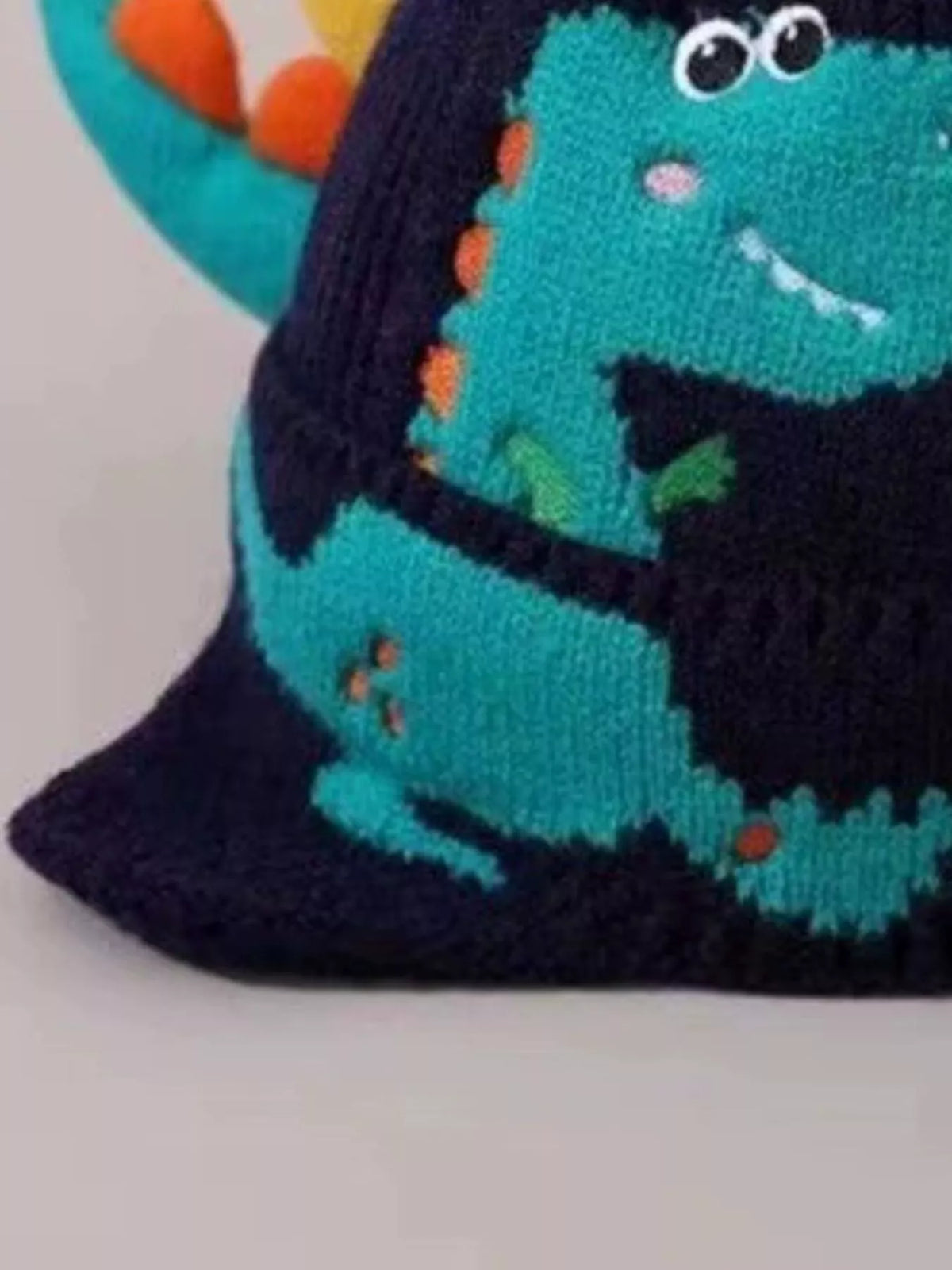 Gorro de dinosaurio de punto para niños
