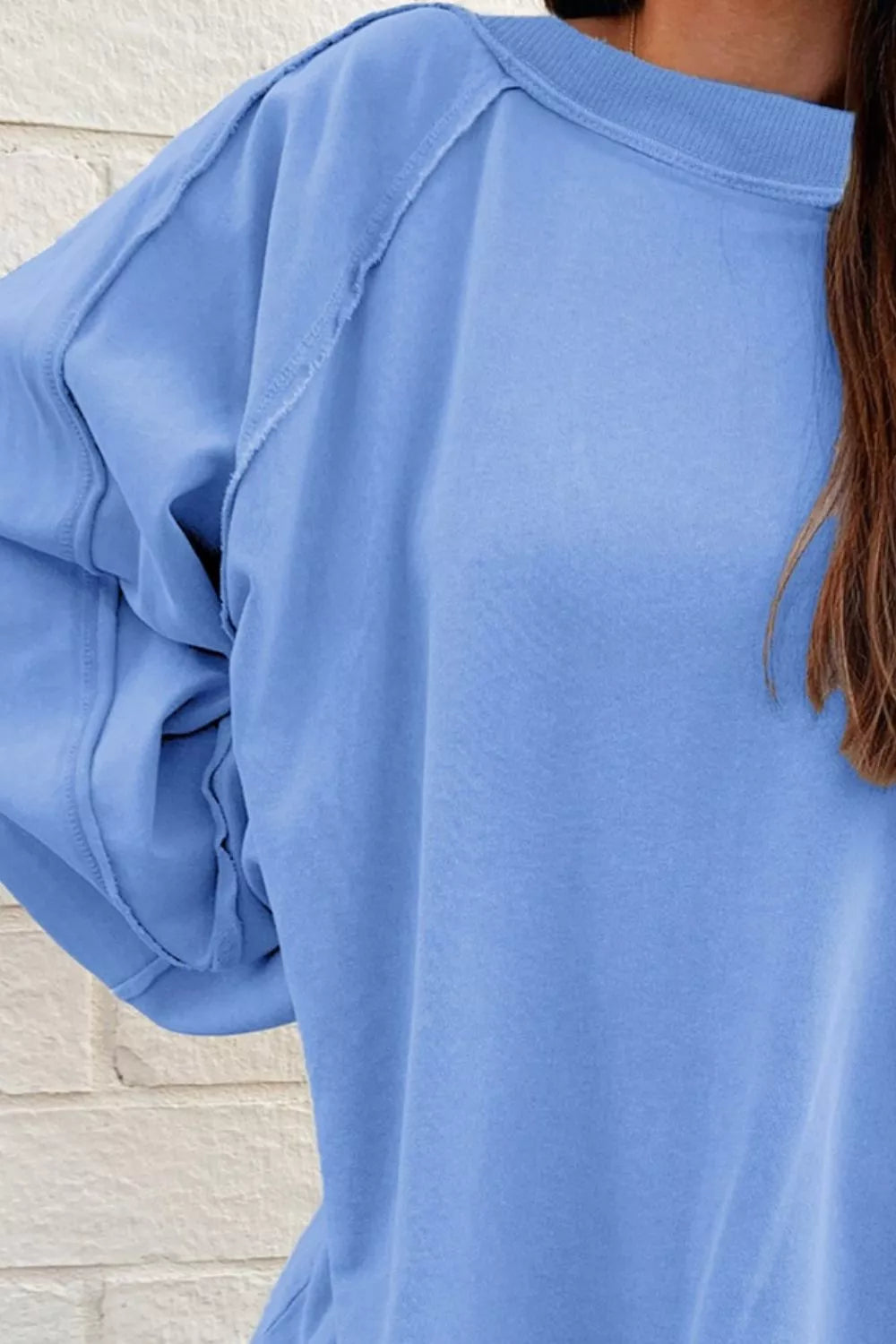 Sudadera de cuello redondo ancha con efecto desgastado