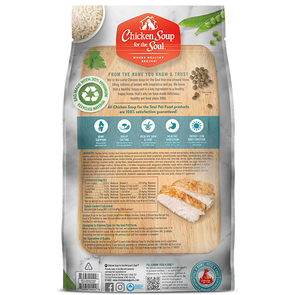 Alimento para perros con pollo maduro, pavo y arroz integral.
