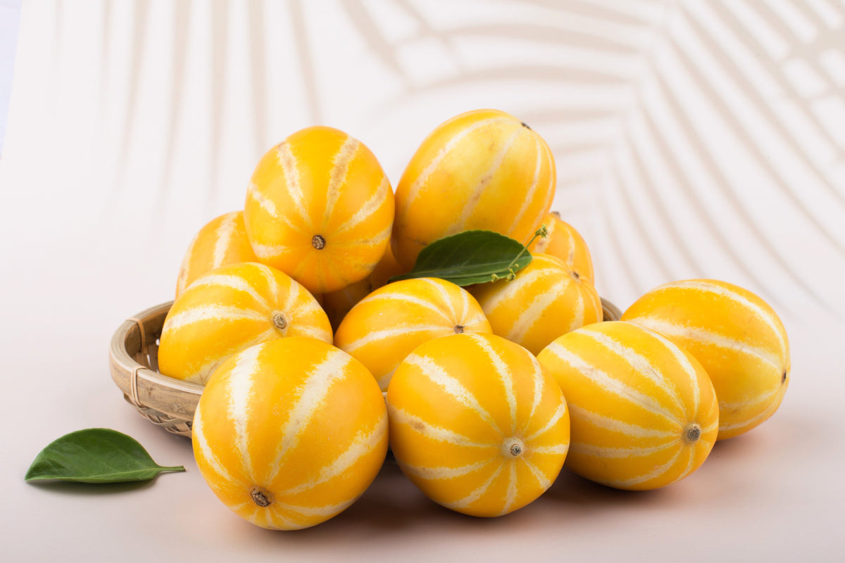 50 MELÓN DE LÍNEA PLATA TEMPRANA Cucumis Melo Piel con rayas amarillas Pulpa blanca Semillas de fruta coreana